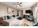 Bright and airy living room with comfortable seating and large windows at 4311 E Roma Ave, Phoenix, AZ 85018