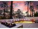 Relaxing patio area with fire pit and comfortable seating at 4311 E Roma Ave, Phoenix, AZ 85018