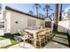 Patio with large outdoor dining table and seating at 4311 E Roma Ave, Phoenix, AZ 85018