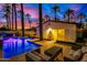 Backyard oasis with a pool, patio furniture, and sunset views at 4311 E Roma Ave, Phoenix, AZ 85018