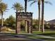 Rancho El Dorado community entrance with stone archway at 43594 W Bravo Ct, Maricopa, AZ 85138