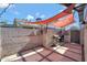 Backyard patio with shade sails and grill at 4832 W Caron St, Glendale, AZ 85302