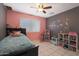 bedroom with a twin bed and toy storage at 4832 W Caron St, Glendale, AZ 85302