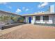 Inviting front entry with a blue door and landscaping at 4832 W Caron St, Glendale, AZ 85302