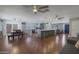 Open concept kitchen, dining and living area with hardwood floors at 4832 W Caron St, Glendale, AZ 85302