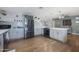 Spacious kitchen with gray cabinets and ample counter space at 4832 W Caron St, Glendale, AZ 85302