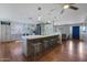 Updated kitchen with gray cabinets and an island at 4832 W Caron St, Glendale, AZ 85302