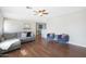 Spacious living room with hardwood floors and comfy seating at 4832 W Caron St, Glendale, AZ 85302