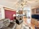 Living room with hardwood floors, two recliners, and a view of the kitchen at 523 S Jaspar Dr, Apache Junction, AZ 85119