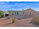 Desert landscape backyard with spacious patio and view of home at 8500 E Southern Ave # 548, Mesa, AZ 85209