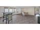Bright bonus room with tile flooring, wet bar, and access to patio at 8500 E Southern Ave # 548, Mesa, AZ 85209