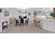 Charming dining area with a table for four and kitchen access at 8500 E Southern Ave # 548, Mesa, AZ 85209