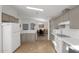 Open concept kitchen with island and view into dining area at 8500 E Southern Ave # 548, Mesa, AZ 85209