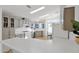 Kitchen with corner sink, white appliances, and an abundance of cabinets at 8500 E Southern Ave # 548, Mesa, AZ 85209
