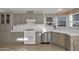 Modern kitchen featuring stainless steel appliances and light-toned cabinetry at 8500 E Southern Ave # 548, Mesa, AZ 85209
