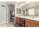 Double vanity bathroom with modern finishes and lots of counter space at 11957 N 140Th Ln, Surprise, AZ 85379
