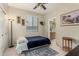 Cozy bedroom with built in closet and adjacent bathroom at 11957 N 140Th Ln, Surprise, AZ 85379