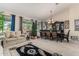 Formal dining room with decorative china cabinet at 11957 N 140Th Ln, Surprise, AZ 85379