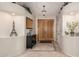 Elegant entryway with high ceilings and decorative niches at 11957 N 140Th Ln, Surprise, AZ 85379