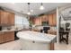 Kitchen with curved island and ample counter space at 11957 N 140Th Ln, Surprise, AZ 85379