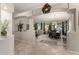 Open floor plan with dining area and access to backyard at 11957 N 140Th Ln, Surprise, AZ 85379