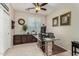 Bright home office with large desk and built in storage at 11957 N 140Th Ln, Surprise, AZ 85379