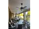 Covered patio with comfortable seating and fire pit at 11957 N 140Th Ln, Surprise, AZ 85379