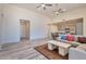 Open concept living room and kitchen with a neutral color palette at 1278 W Calle Tuberia --, Casa Grande, AZ 85194