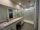 Modern bathroom with double vanity and glass shower at 1298 W Calle Tuberia --, Casa Grande, AZ 85194