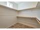 Spacious walk-in closet with ample shelving and hanging space at 1298 W Calle Tuberia --, Casa Grande, AZ 85194