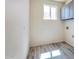 Small laundry room with gray cabinets and vinyl flooring at 1298 W Calle Tuberia --, Casa Grande, AZ 85194