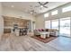 Open floor plan combining living room and kitchen with modern finishes at 1298 W Calle Tuberia --, Casa Grande, AZ 85194
