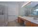 Bathroom boasts dual sinks and a walk-in shower at 3061 N Platina Cir # N, Mesa, AZ 85215