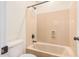 Bathroom with shower/tub combo and beige tile at 322 E Caribbean Dr, Casa Grande, AZ 85122
