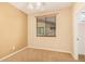Bedroom with carpet, window, and ceiling fan at 322 E Caribbean Dr, Casa Grande, AZ 85122
