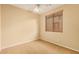 Bedroom with carpet, window, and ceiling fan at 322 E Caribbean Dr, Casa Grande, AZ 85122