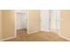 Bedroom with closet and neutral colored carpet at 322 E Caribbean Dr, Casa Grande, AZ 85122