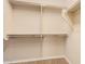 Large walk-in closet with double hanging rods at 322 E Caribbean Dr, Casa Grande, AZ 85122