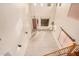 Bright and airy entryway with tile floors and a chandelier at 322 E Caribbean Dr, Casa Grande, AZ 85122