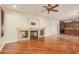 Living room featuring hardwood floors, a fireplace, and recessed lighting at 322 E Caribbean Dr, Casa Grande, AZ 85122