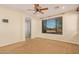 Main bedroom with large window and glass shower at 322 E Caribbean Dr, Casa Grande, AZ 85122