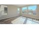Bright bedroom with hardwood floors and large windows at 389 E Bracciano Ave, Queen Creek, AZ 85140