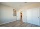 Bedroom with double door closet and access to bathroom at 389 E Bracciano Ave, Queen Creek, AZ 85140