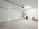 Spacious two-car garage with ample storage space and clean finishes at 389 E Bracciano Ave, Queen Creek, AZ 85140