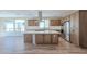 Modern kitchen with an island and stainless steel appliances at 389 E Bracciano Ave, Queen Creek, AZ 85140