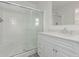 Clean bathroom with a walk-in shower and modern vanity at 5201 W Camelback Rd # A187, Phoenix, AZ 85031