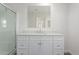 Bright bathroom with a vanity, large mirror, and shower at 5201 W Camelback Rd # A187, Phoenix, AZ 85031