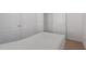 Bedroom with neutral decor and view of entryway at 5201 W Camelback Rd # A187, Phoenix, AZ 85031