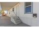 Front entrance of manufactured home with steps and railing at 5201 W Camelback Rd # A187, Phoenix, AZ 85031