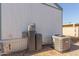 Home exterior showing water heater and air conditioning unit at 5201 W Camelback Rd # A187, Phoenix, AZ 85031